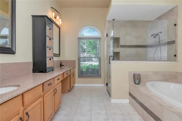 $725,000 | 5132 Whispering Leaf Trail, Valrico, FL 33596