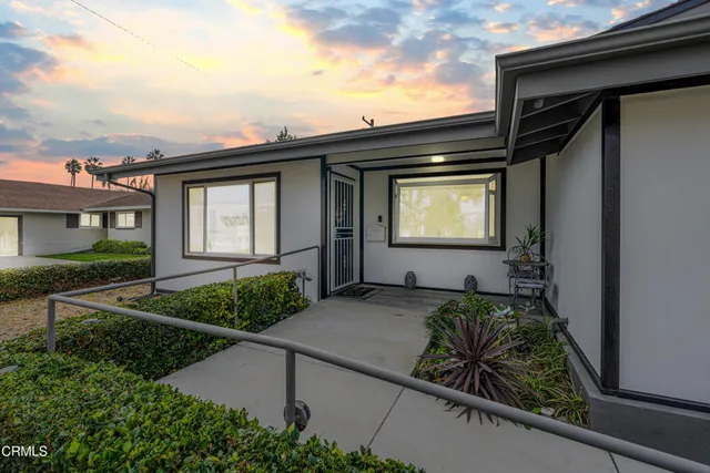 a house view with a garden space