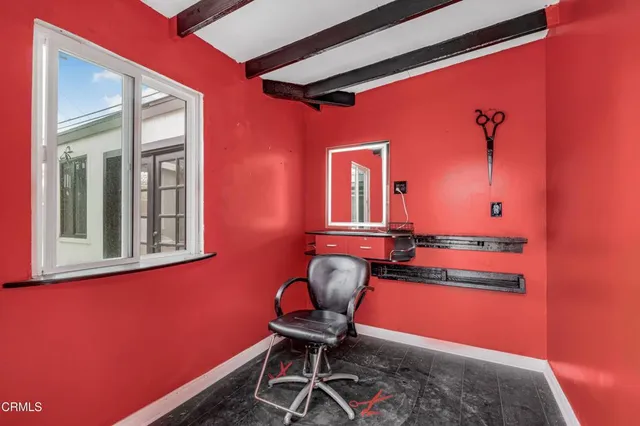 a room with furniture and wooden floor