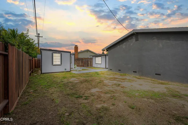 a house view with a backyard space