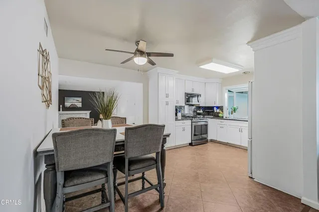 a view of kitchen with breakfast area