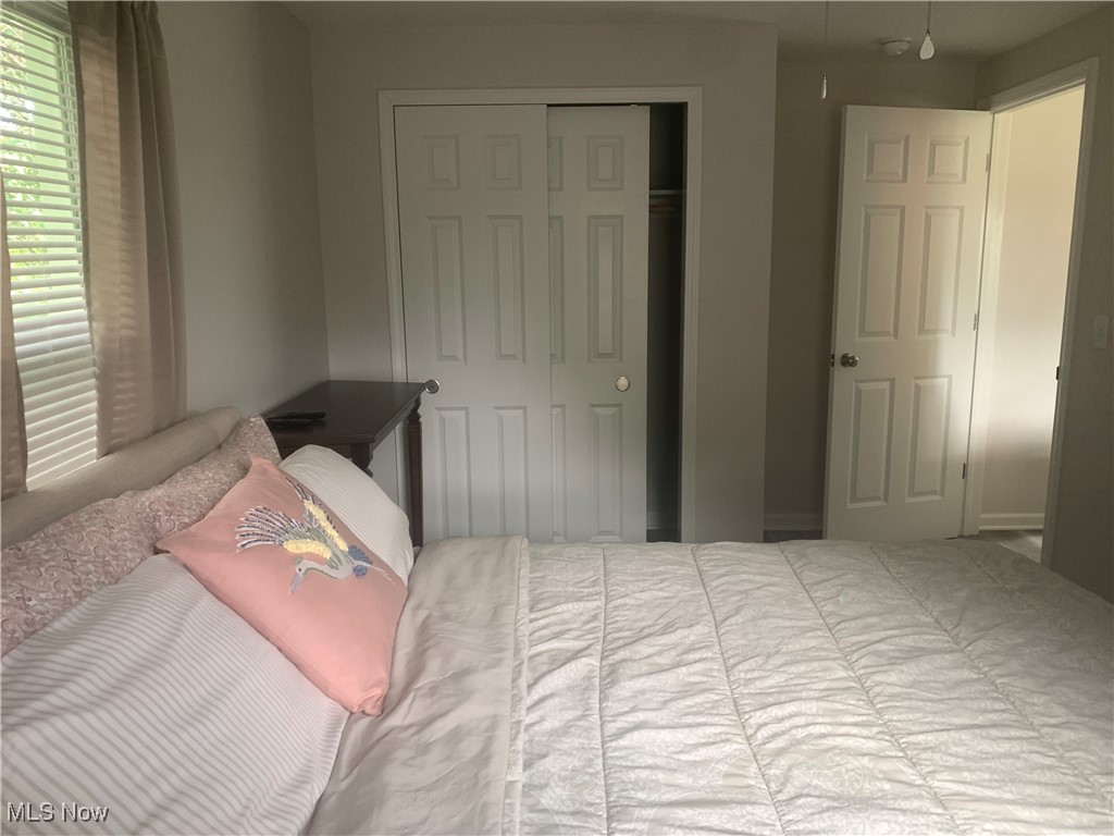1714 Woods Road Akron, OH 44306 - Photo 21 of 28 Plentiful closet space in the main bedroom