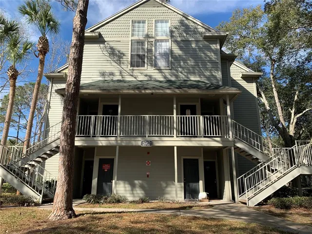 a front view of a house with a balcony