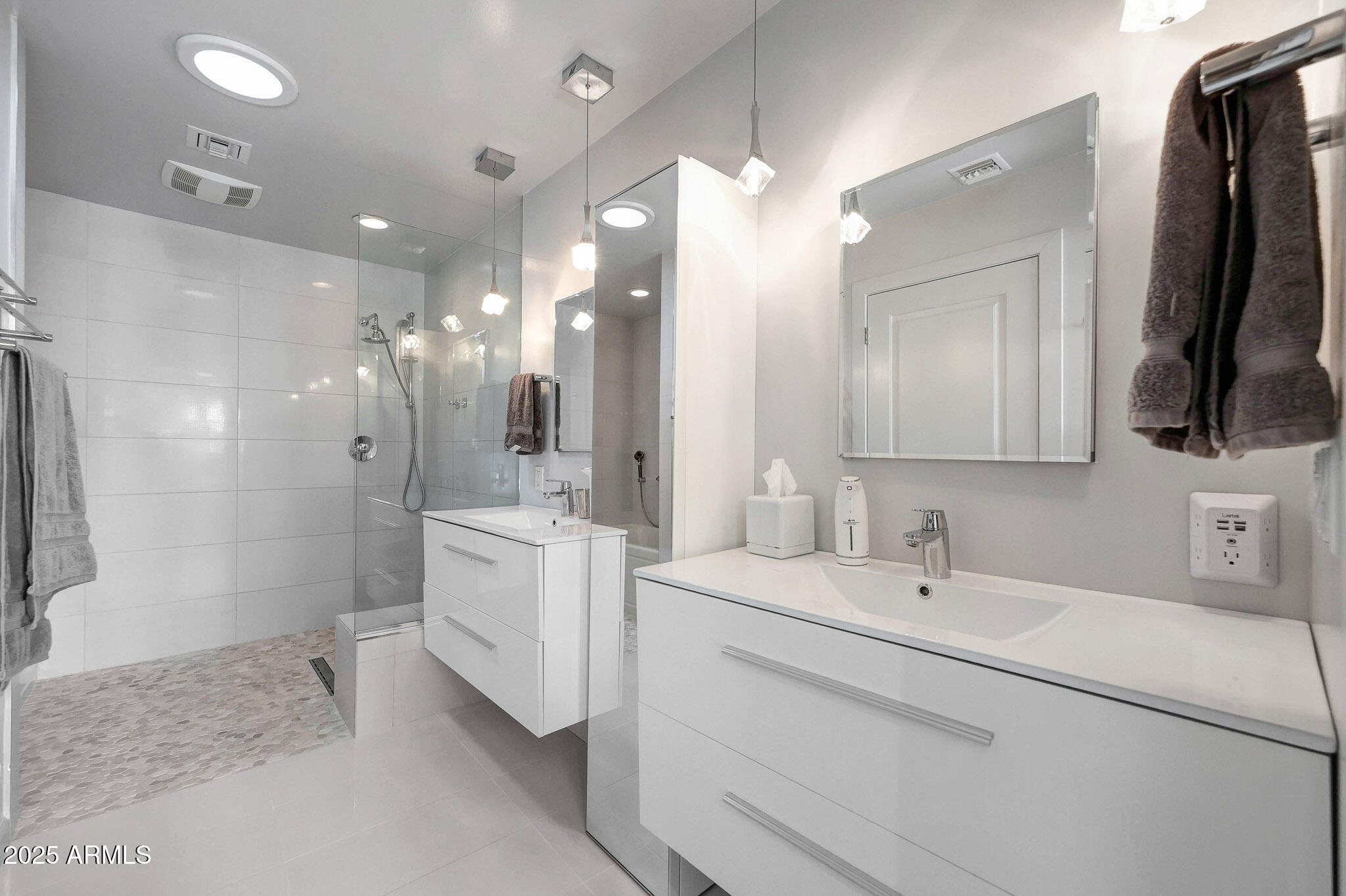 4435 North 35th Street Phoenix, AZ 85018 - Photo 20 of 35 a bathroom with a double vanity sink mirror and shower