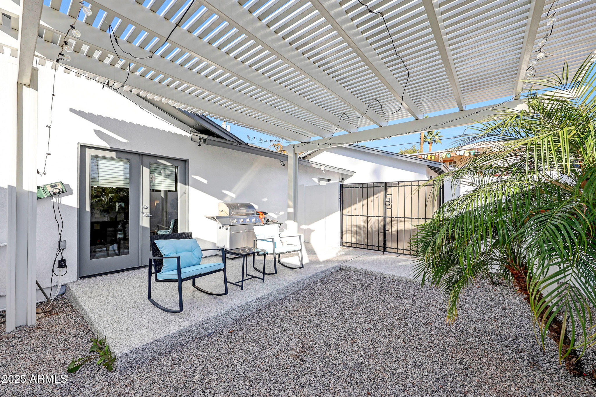 4435 North 35th Street Phoenix, AZ 85018 - Photo 29 of 35 a view of a chairs with table in patio