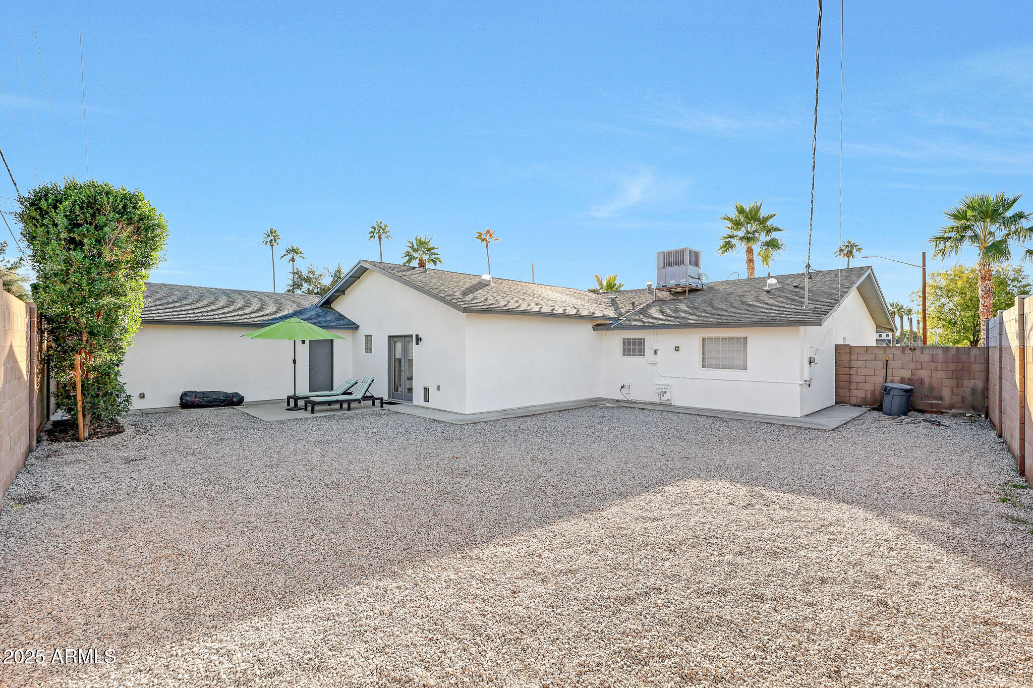 4435 North 35th Street Phoenix, AZ 85018 - Photo 32 of 35 a view of a house with a yard and garage