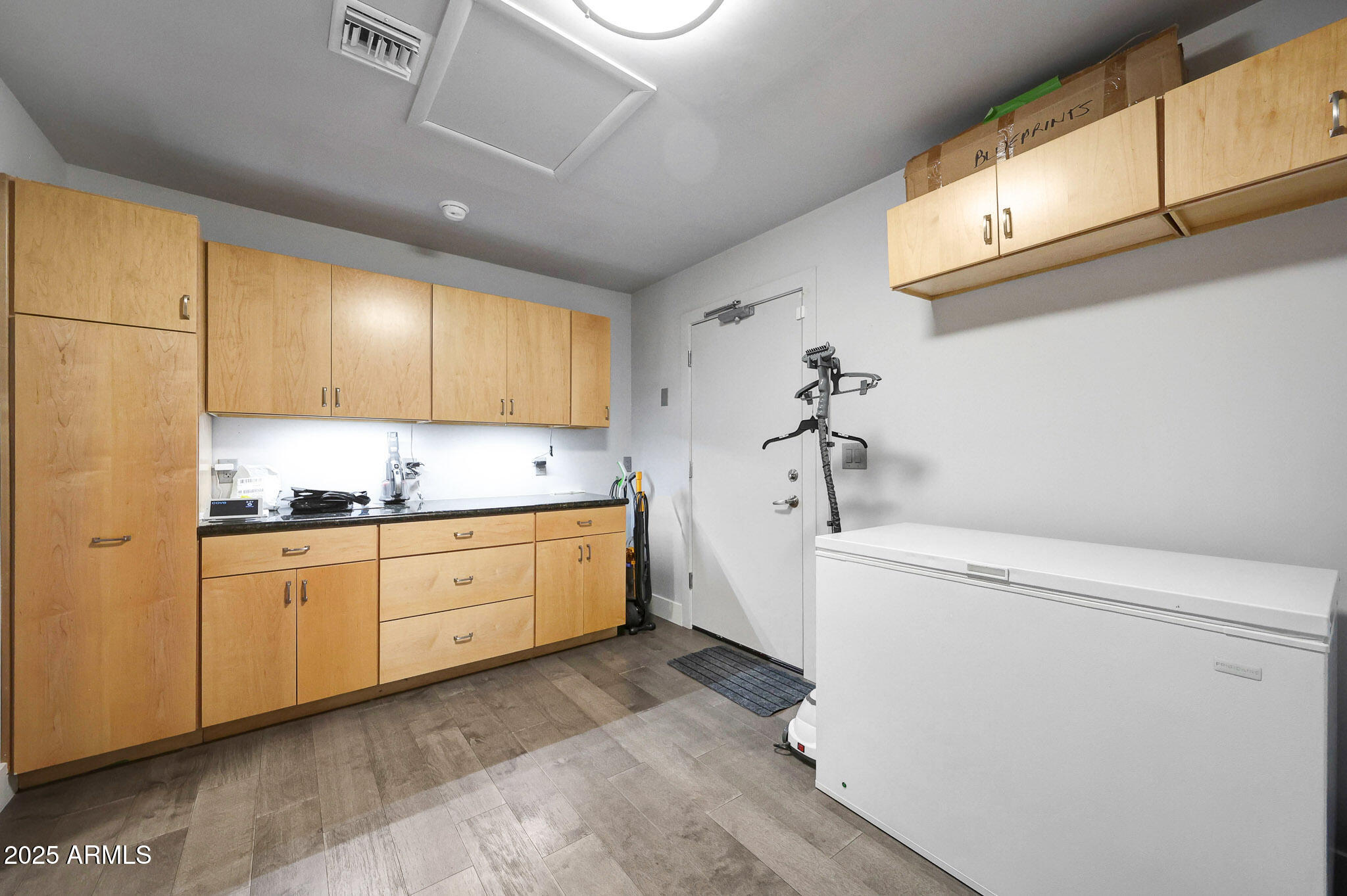 4435 North 35th Street Phoenix, AZ 85018 - Photo 35 of 35 a room with dryer and washer