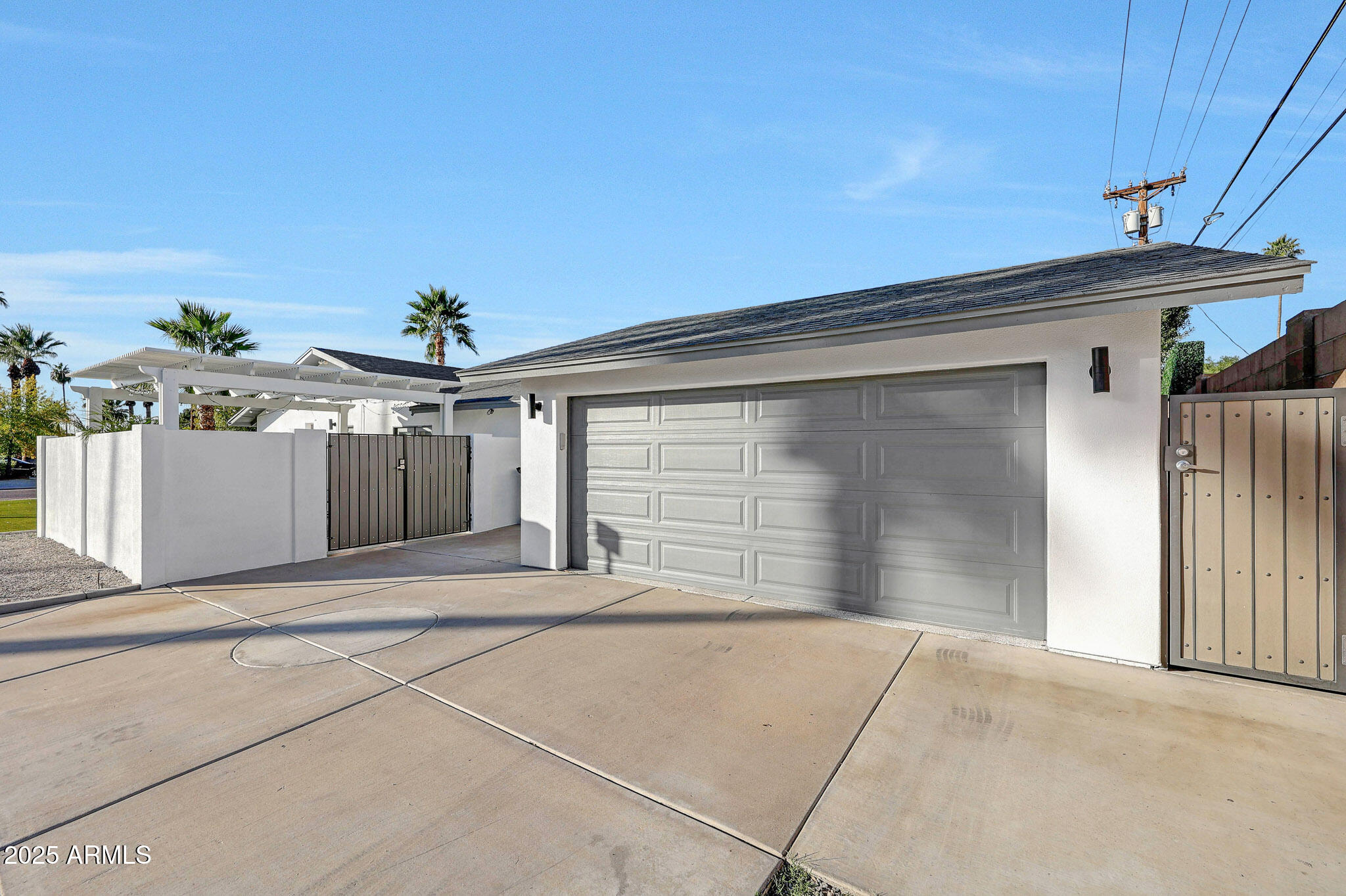 4435 North 35th Street Phoenix, AZ 85018 - Photo 8 of 35 a view of a house with a garage