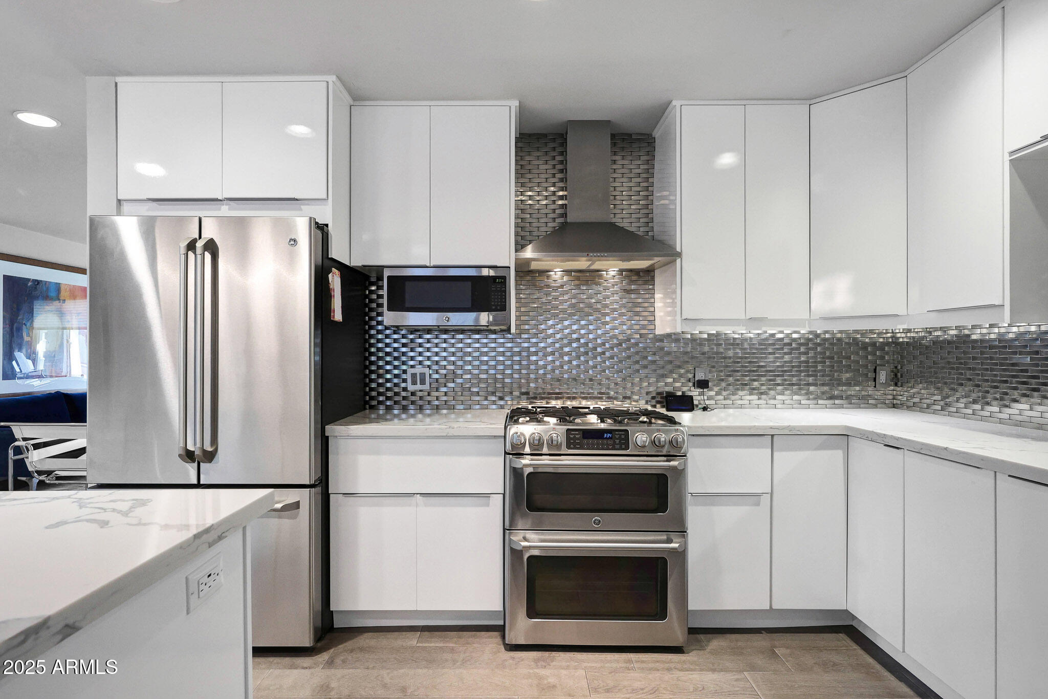 4435 North 35th Street Phoenix, AZ 85018 - Photo 10 of 35 a kitchen with a stove and a refrigerator