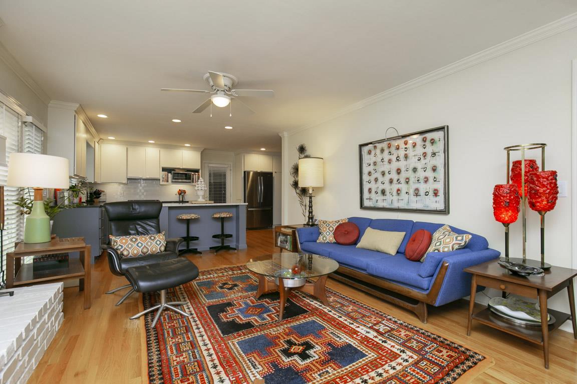 885 Holly Tree Gap Road Brentwood, TN 37027 - Photo 28 of 28 a living room with furniture kitchen view and a table