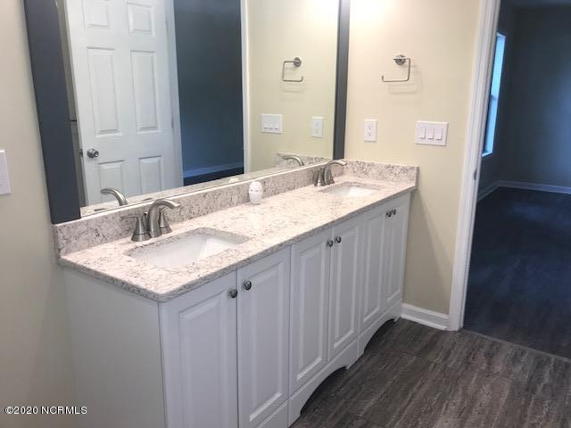 94 Cedar Tree Lane Southwest Calabash, NC 28467 - Photo 31 of 41 Double vanity with custom mirror and frame