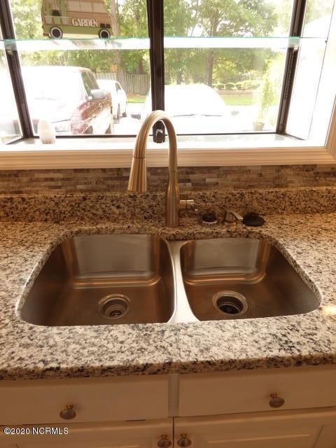 94 Cedar Tree Lane Southwest Calabash, NC 28467 - Photo 8 of 41 Garden window, double sinks and new garbage disposal