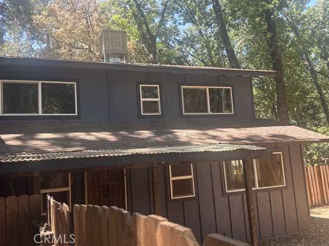 14301 Sinclair Circle Magalia, CA 95954 - Photo 6 of 13 a view of a house with a backyard