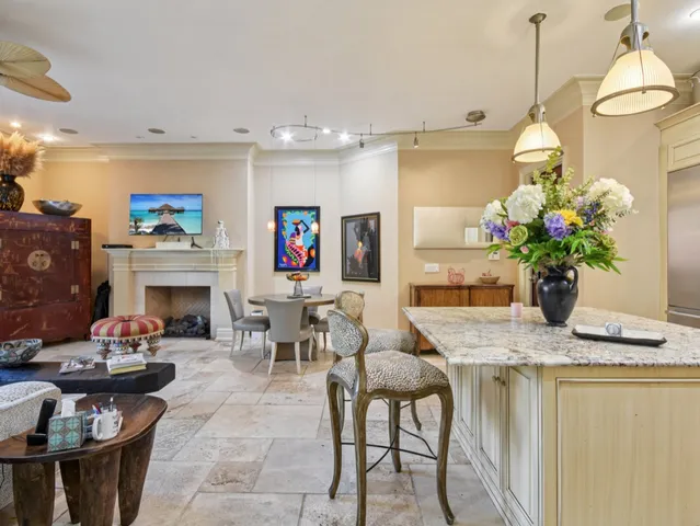 a dining room with furniture and window