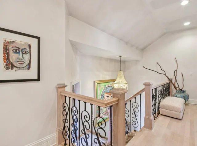 a kitchen area with granite countertop a sink and a window