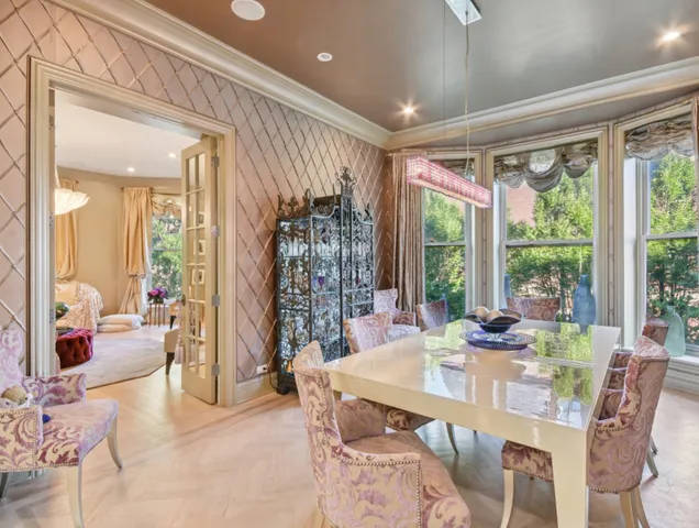 a kitchen with sink and refrigerator