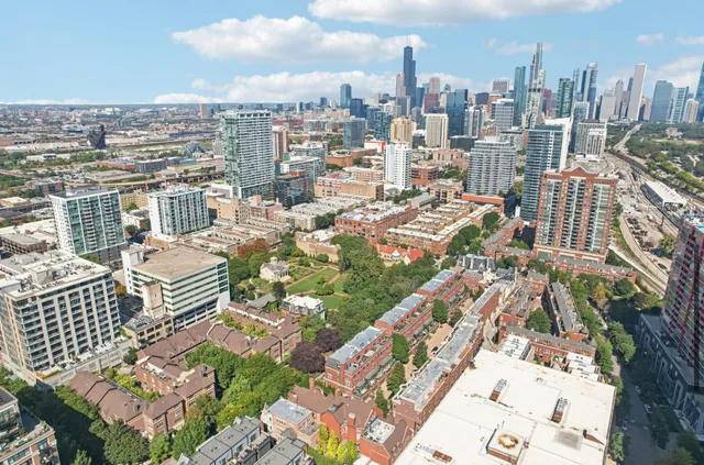 a view of a city with tall buildings