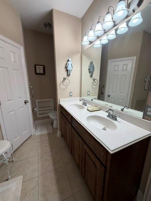 202 Tower Circle Terrell, TX 75160 - Photo 26 of 39 a bathroom with a sink a vanity and a mirror