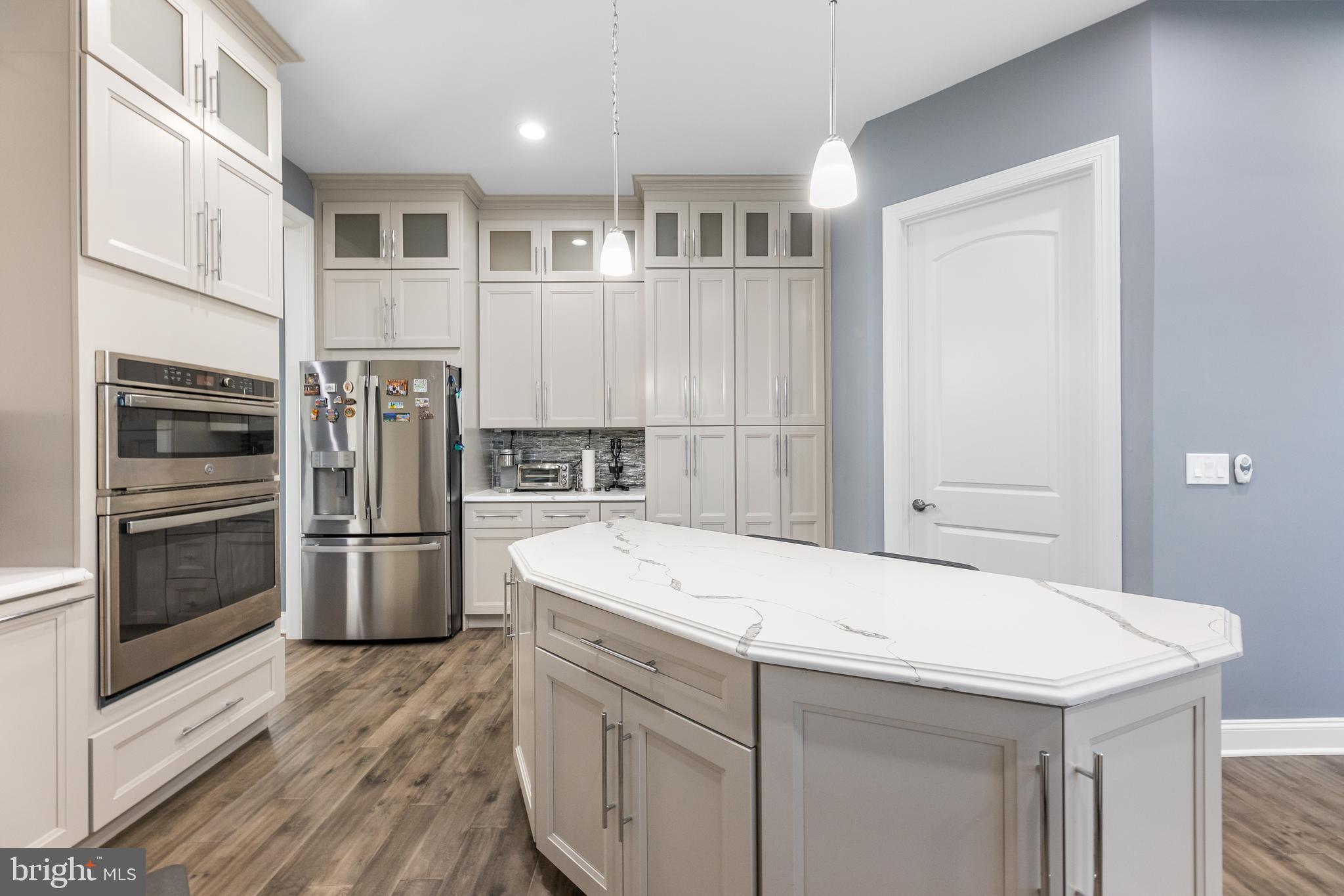 22 Samjan Circle Hightstown, NJ 08520 - Photo 11 of 31 a kitchen with a sink and stainless steel appliances