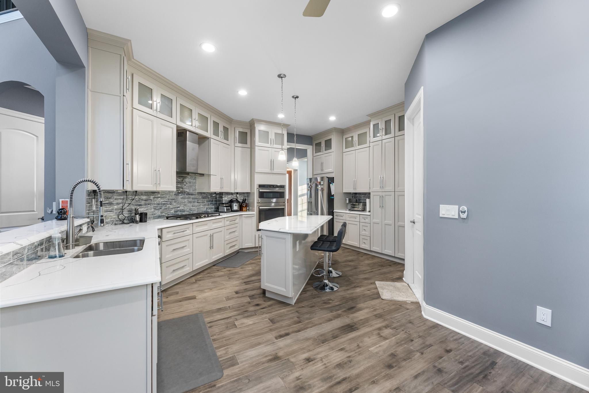 22 Samjan Circle Hightstown, NJ 08520 - Photo 14 of 31 a kitchen with a sink appliances cabinets and furniture