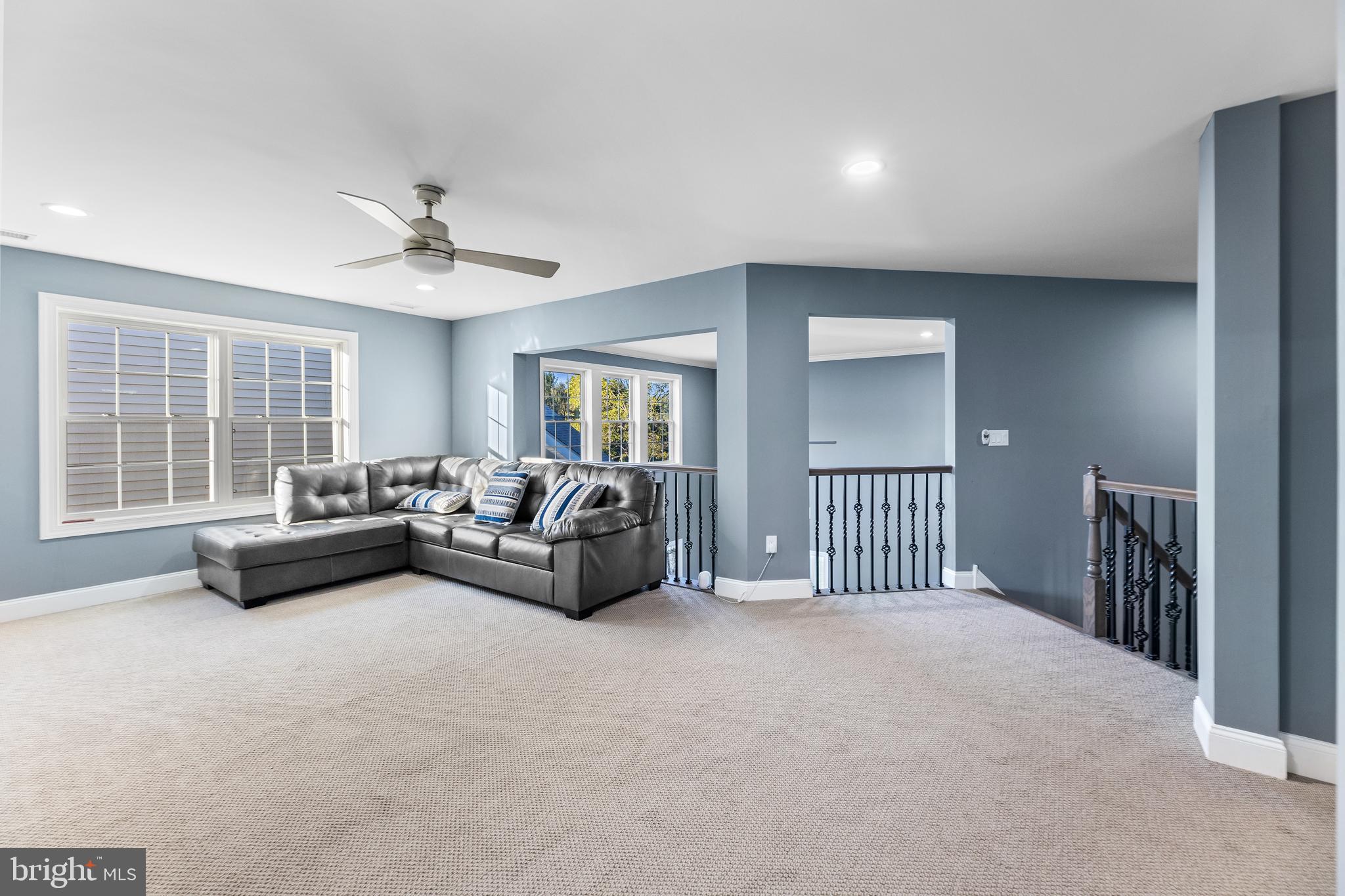 22 Samjan Circle Hightstown, NJ 08520 - Photo 19 of 31 a spacious bedroom with a bed and a couch
