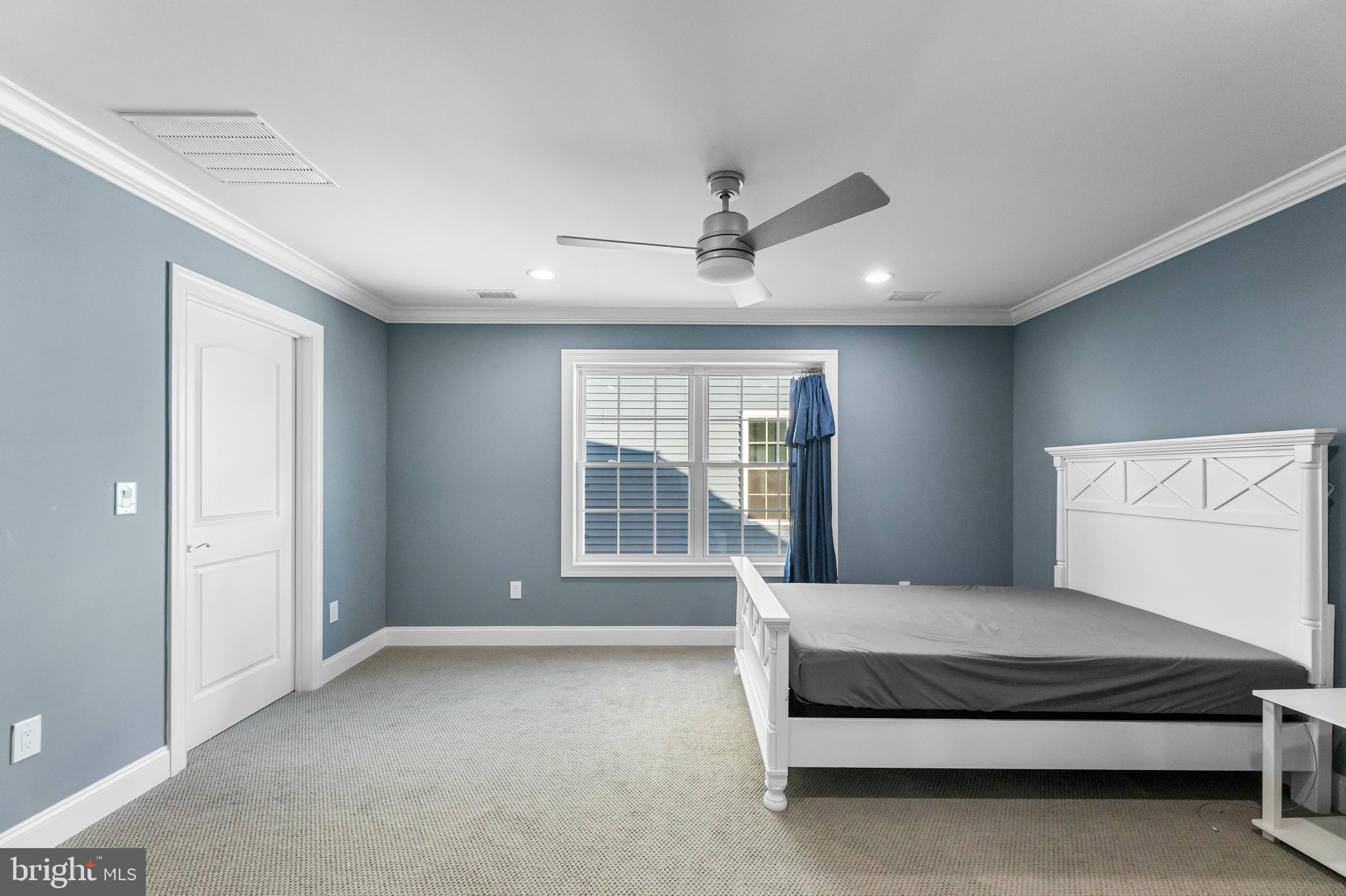 22 Samjan Circle Hightstown, NJ 08520 - Photo 22 of 31 a spacious bedroom with a large bed and windows