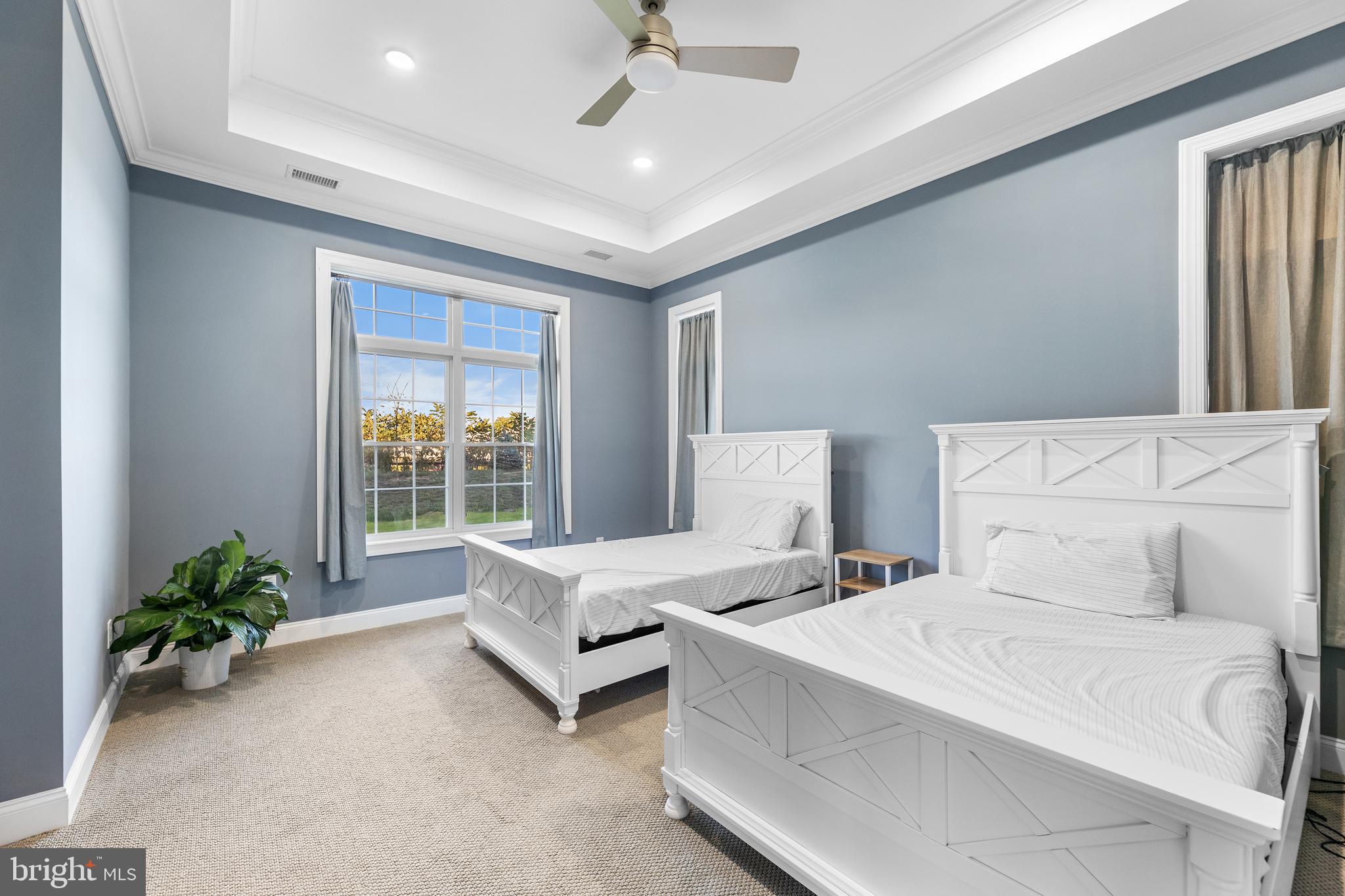 22 Samjan Circle Hightstown, NJ 08520 - Photo 25 of 31 a bedroom with a bed and a chandelier