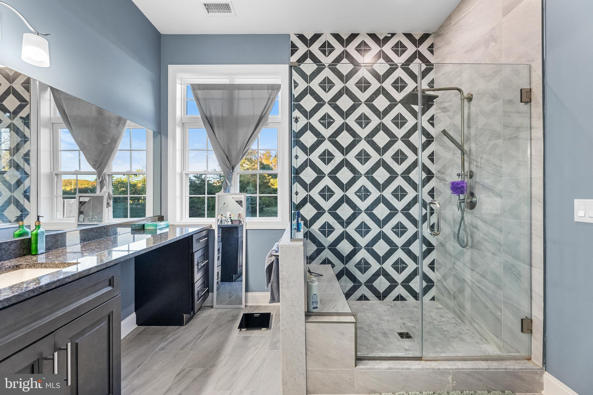 22 Samjan Circle Hightstown, NJ 08520 - Photo 26 of 31 a view of a bathroom with a sink and a shower