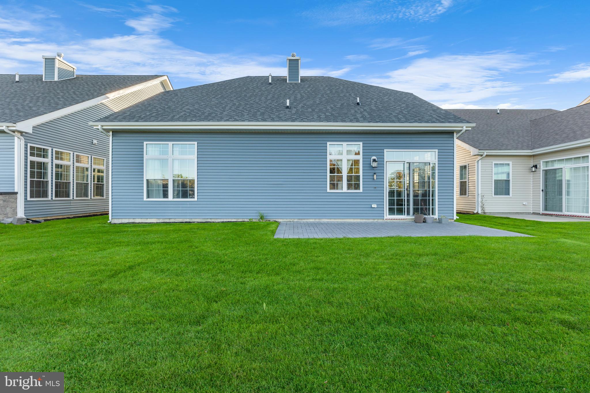 22 Samjan Circle Hightstown, NJ 08520 - Photo 29 of 31 a front view of a house with a yard