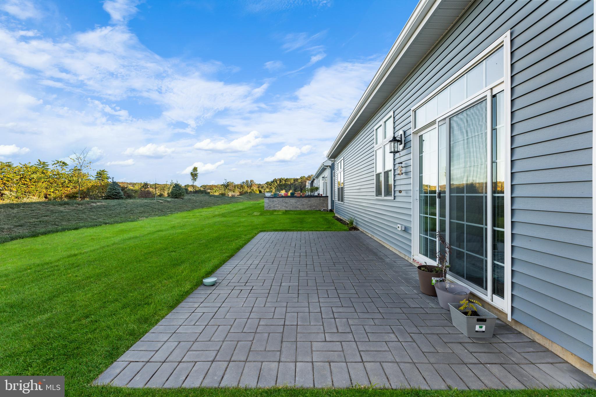 22 Samjan Circle Hightstown, NJ 08520 - Photo 31 of 31 a view of a backyard with sitting area