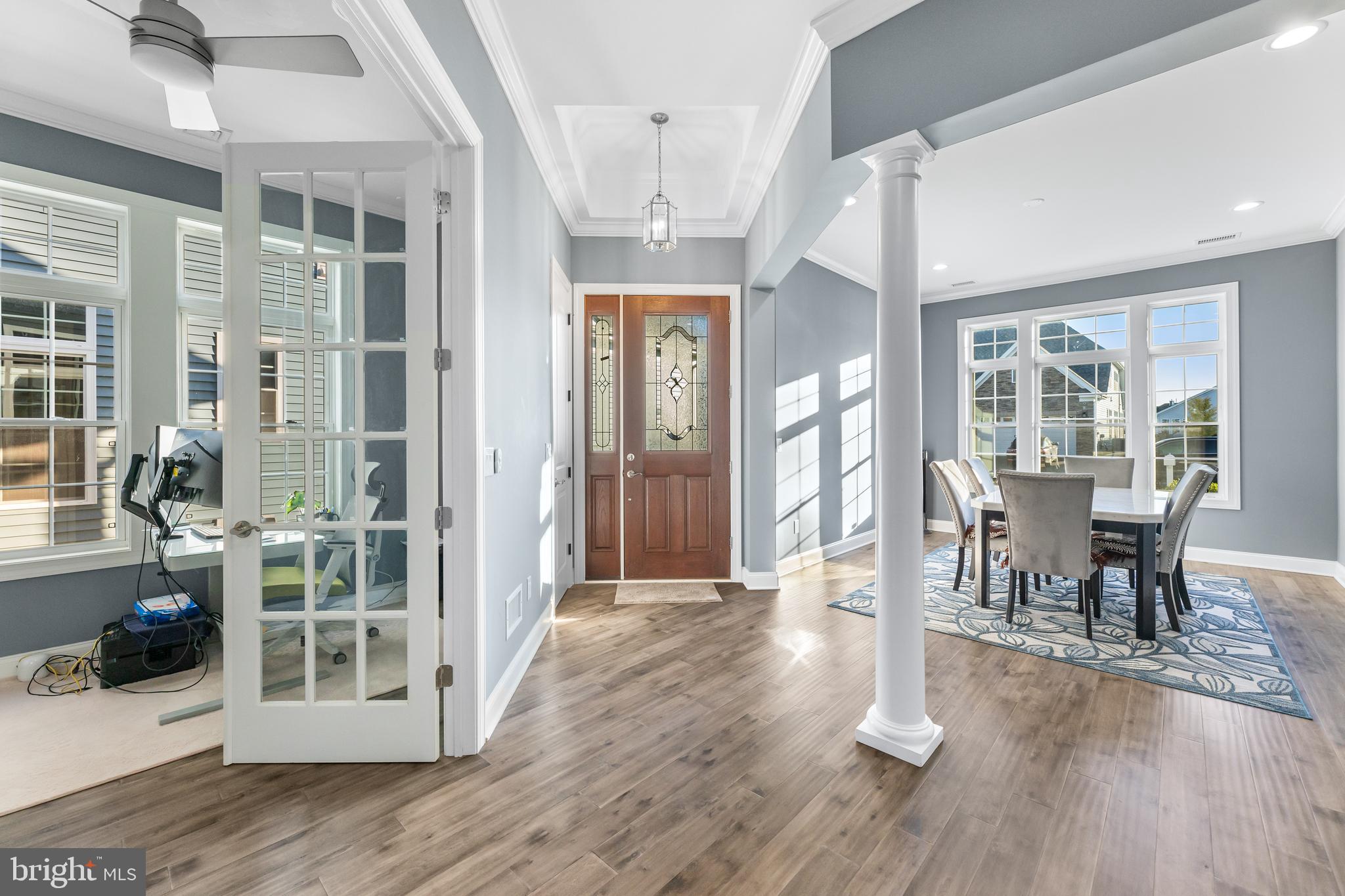 22 Samjan Circle Hightstown, NJ 08520 - Photo 4 of 31 a view of a dining room with furniture window and wooden floor