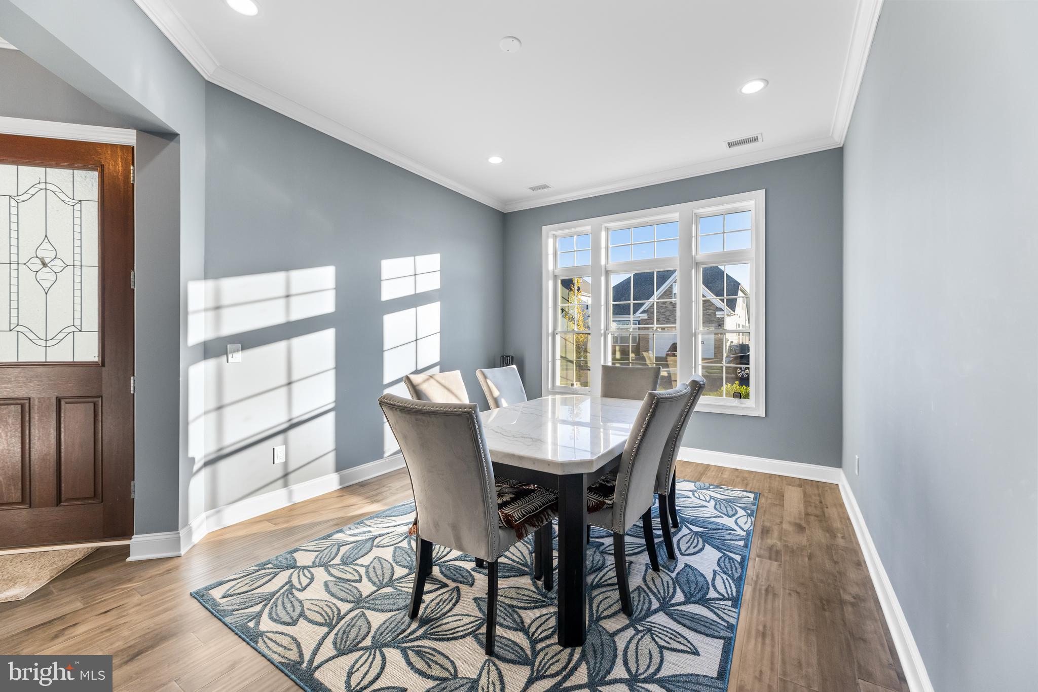 22 Samjan Circle Hightstown, NJ 08520 - Photo 5 of 31 a view of a dining room with furniture and wooden floor