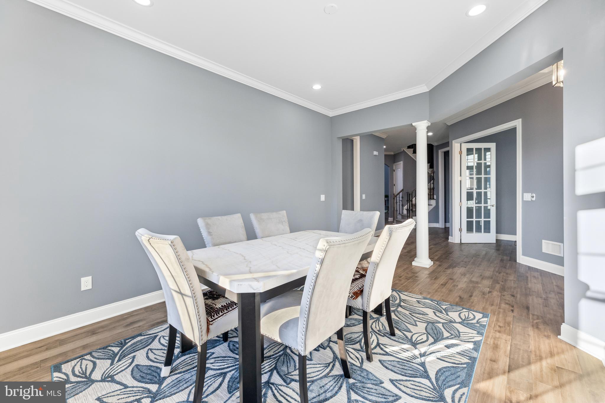22 Samjan Circle Hightstown, NJ 08520 - Photo 6 of 31 a view of a dining room with furniture and wooden floor