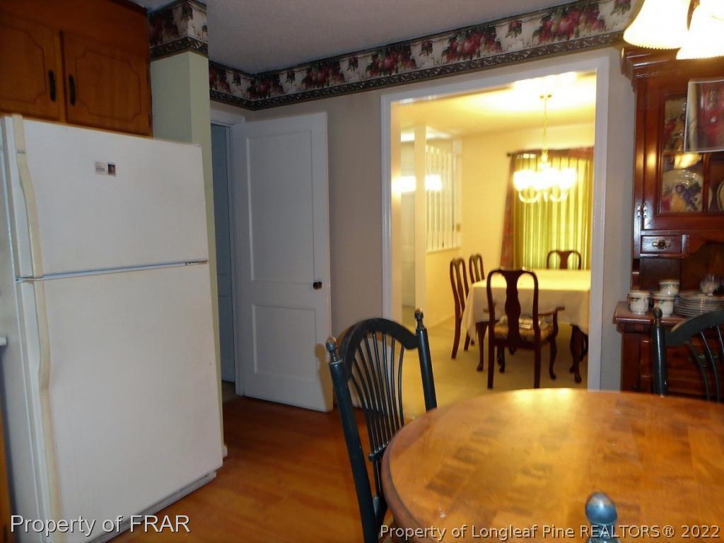 5048 Cameron Road Hope Mills, NC 28348 - Photo 11 of 15 a view of kitchen with furniture and shower