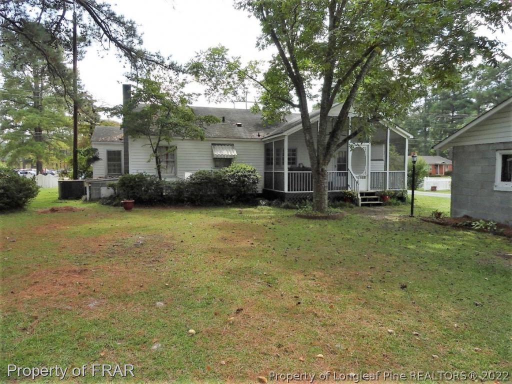 5048 Cameron Road Hope Mills, NC 28348 - Photo 3 of 15 a view of a house with a yard