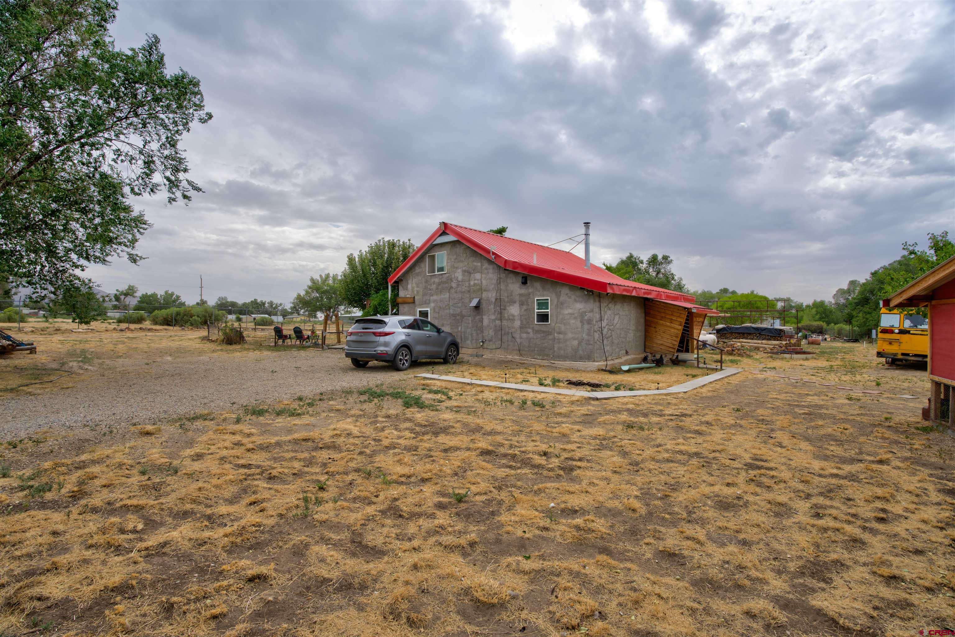 6597 Road 23 Cortez, CO 81321 - Photo 17 of 38 a car parked on the side of the road