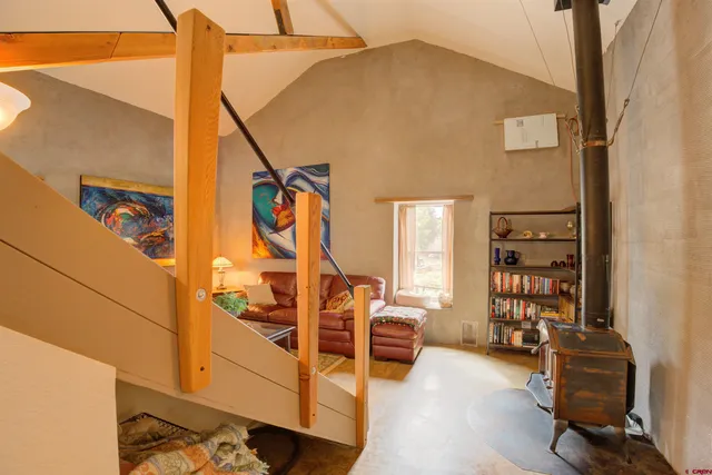 a room that has a sink and a refrigerator