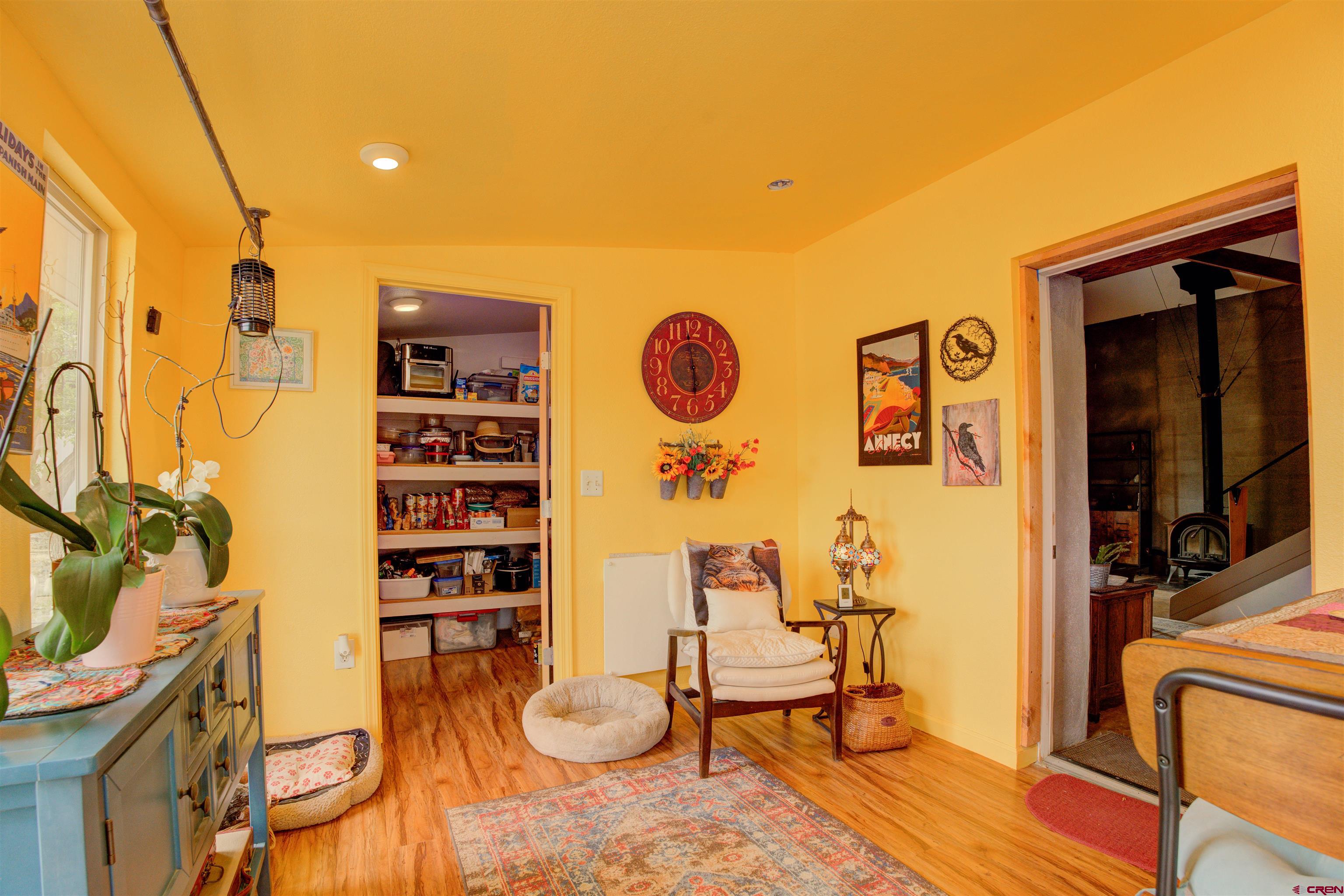 6597 Road 23 Cortez, CO 81321 - Photo 29 of 38 a view of balcony furniture and wooden floor