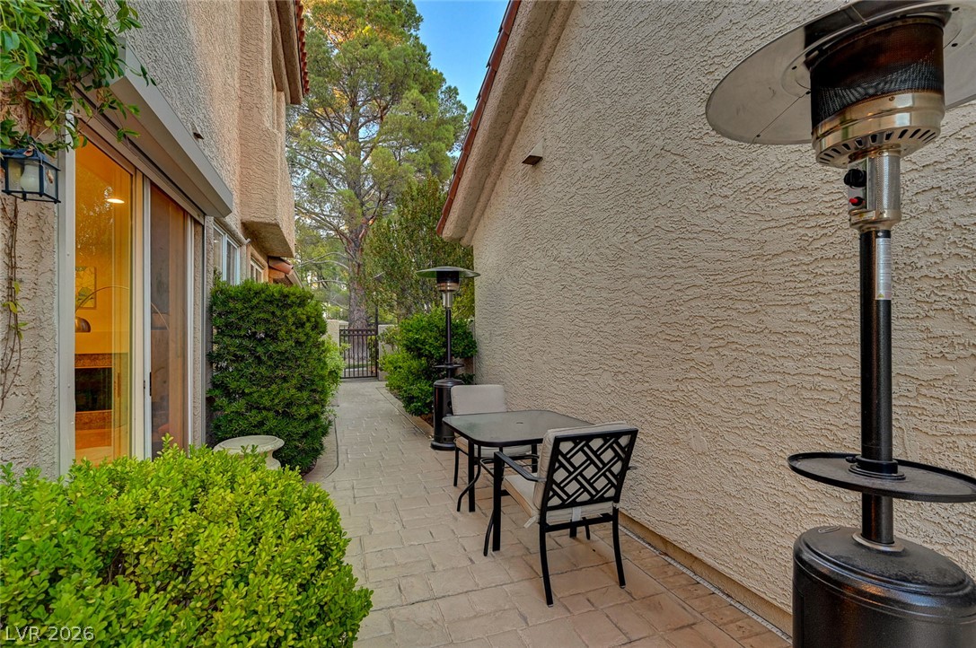 7995 Rio Rico Drive Las Vegas, NV 89113 - Photo 47 of 92 A charming patio area offers an inviting space for al fresco relaxation.