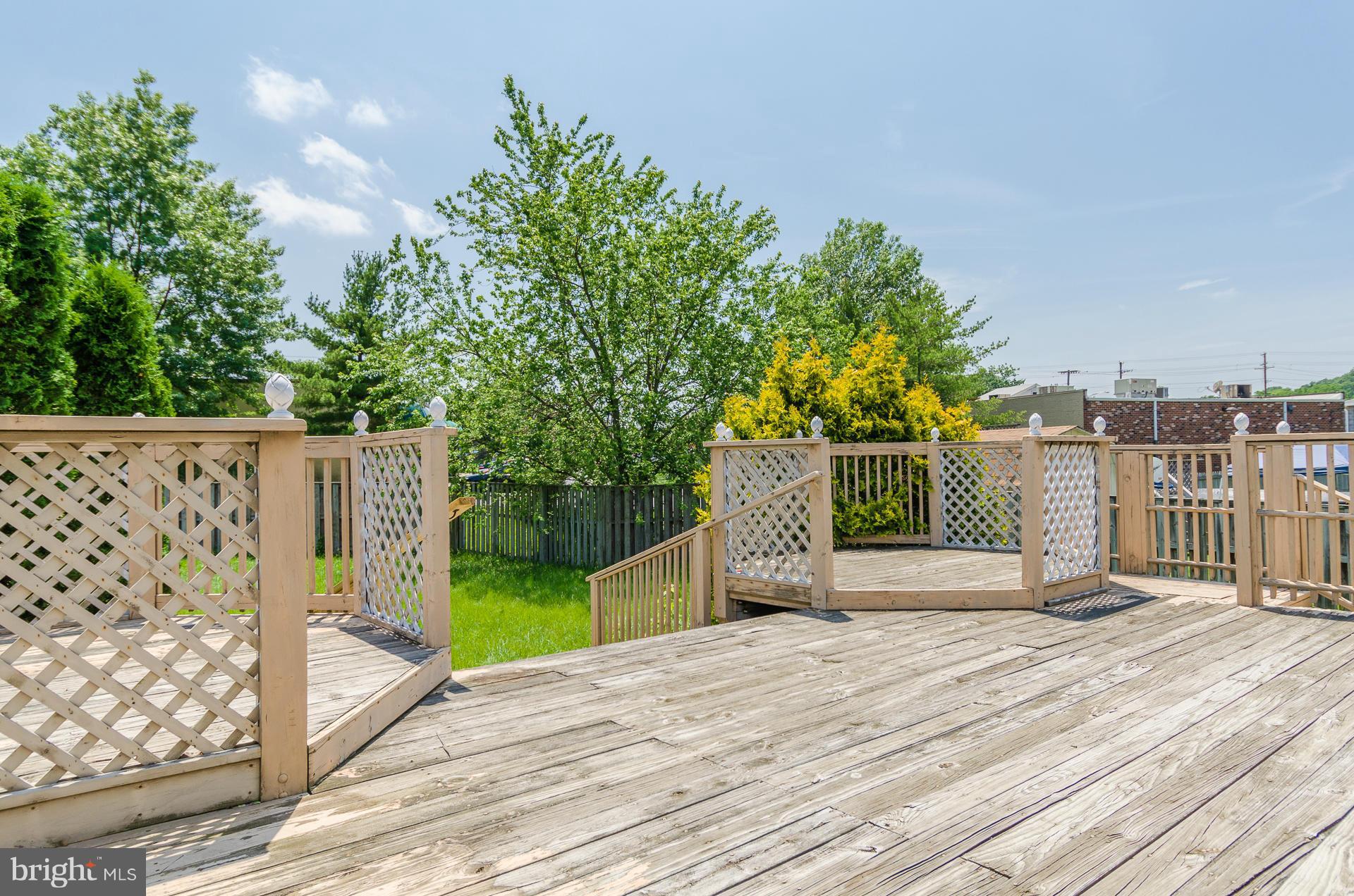 3123 Ripple Road Baltimore, MD 21244 - Photo 22 of 29 a view of a deck with a yard