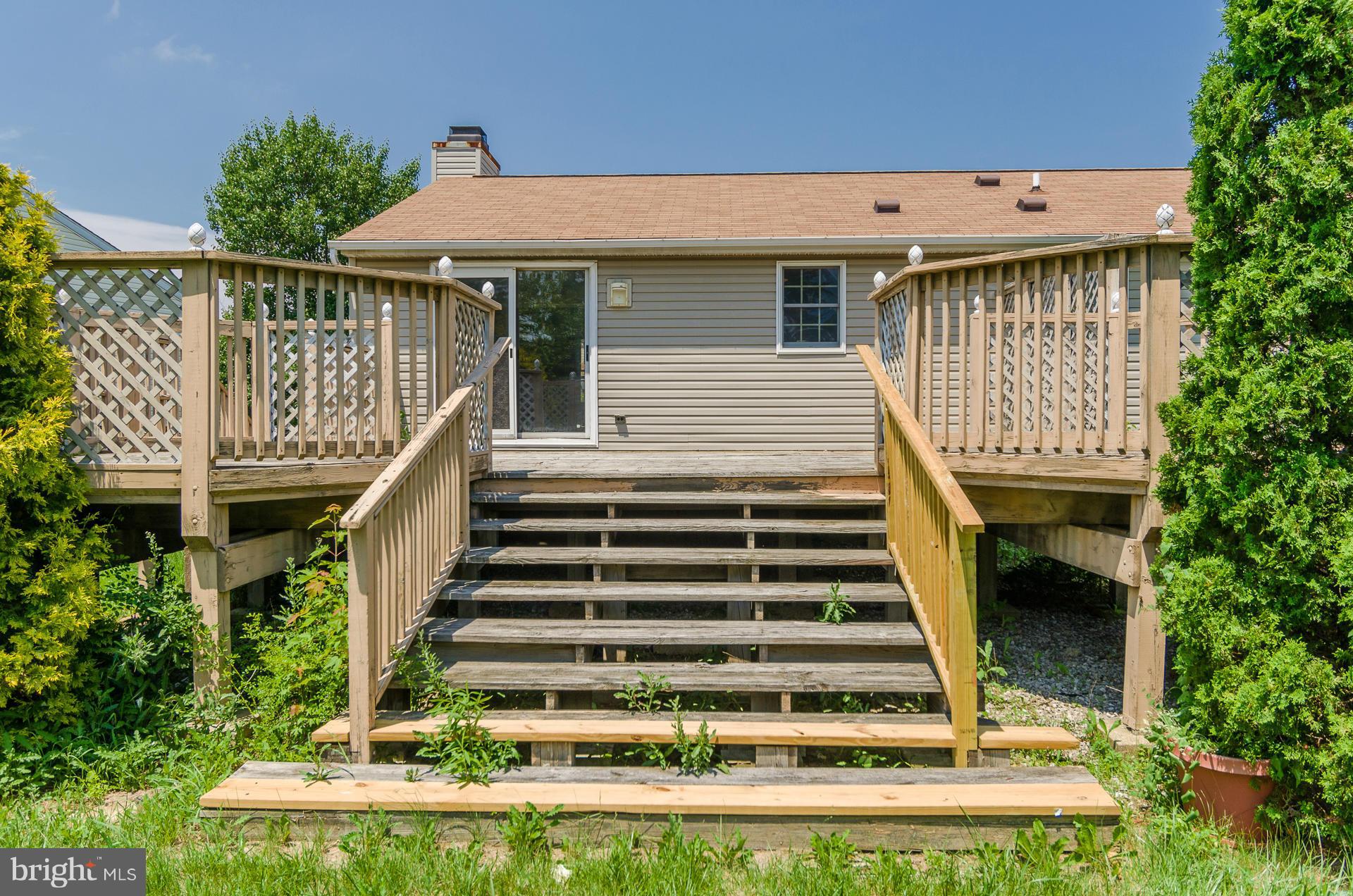 3123 Ripple Road Baltimore, MD 21244 - Photo 23 of 29 a view of a house with wooden floor fence and a porch