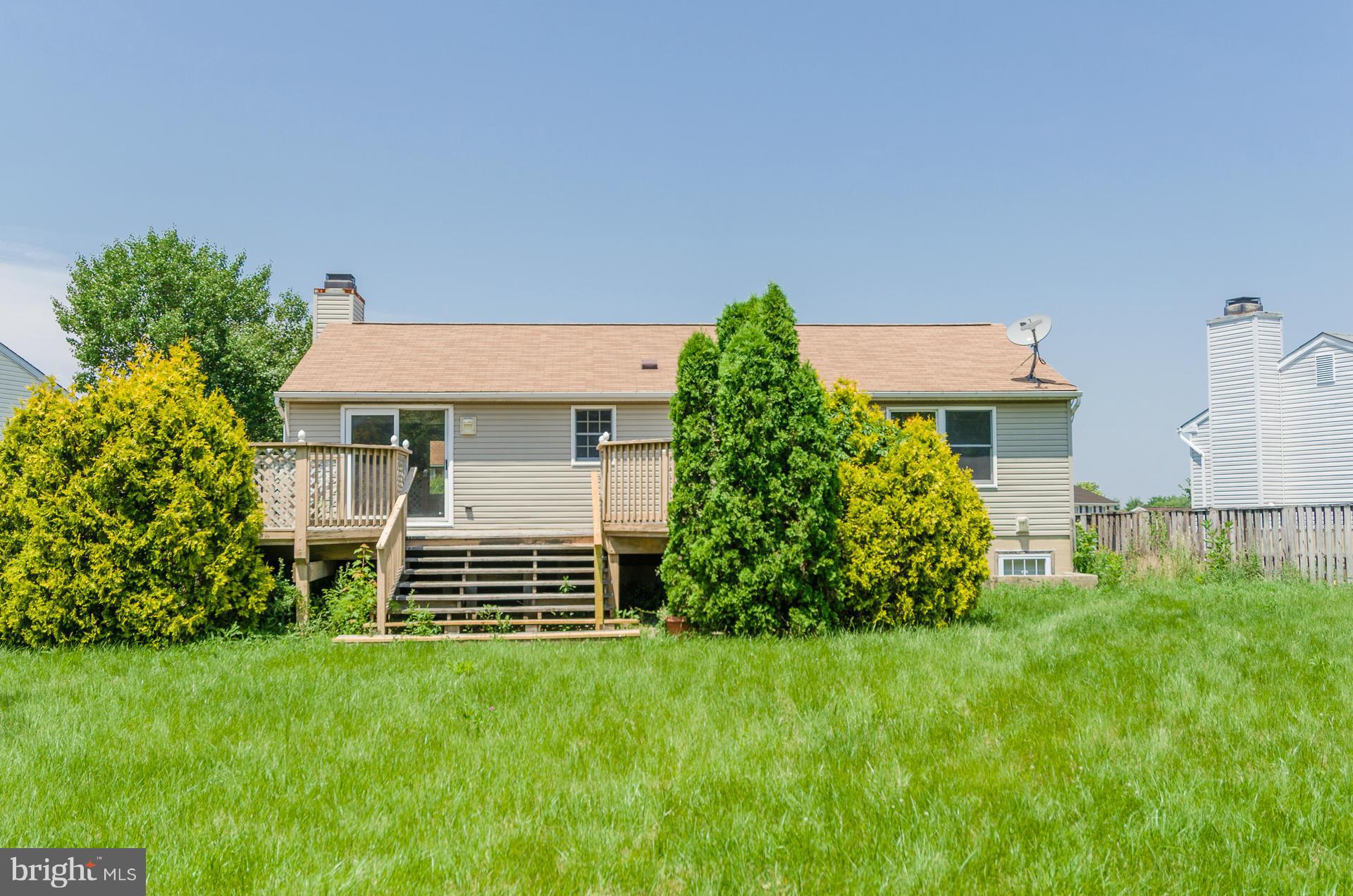 3123 Ripple Road Baltimore, MD 21244 - Photo 25 of 29 front view of a house with a yard