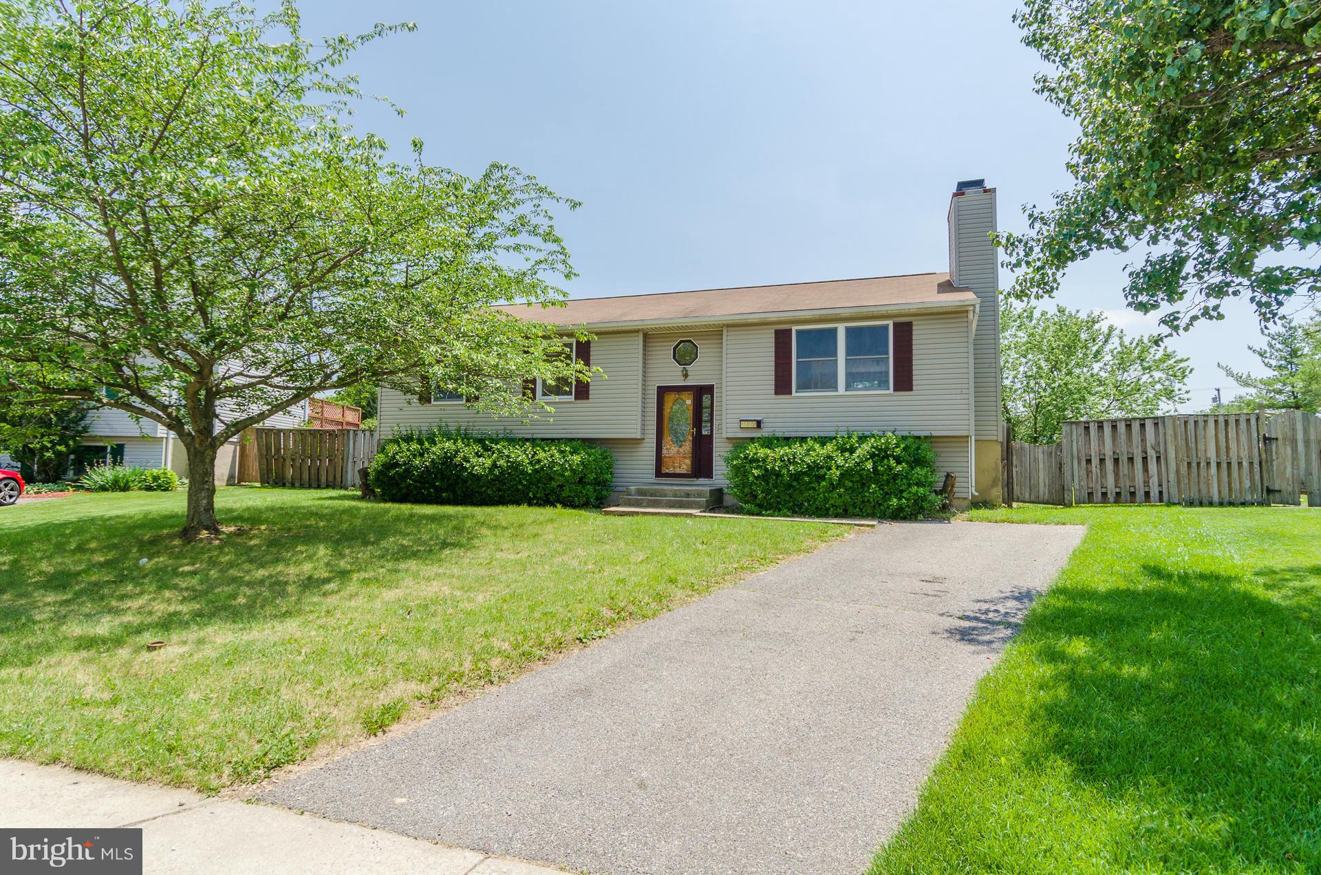 3123 Ripple Road Baltimore, MD 21244 - Photo 27 of 29 a front view of a house with garden