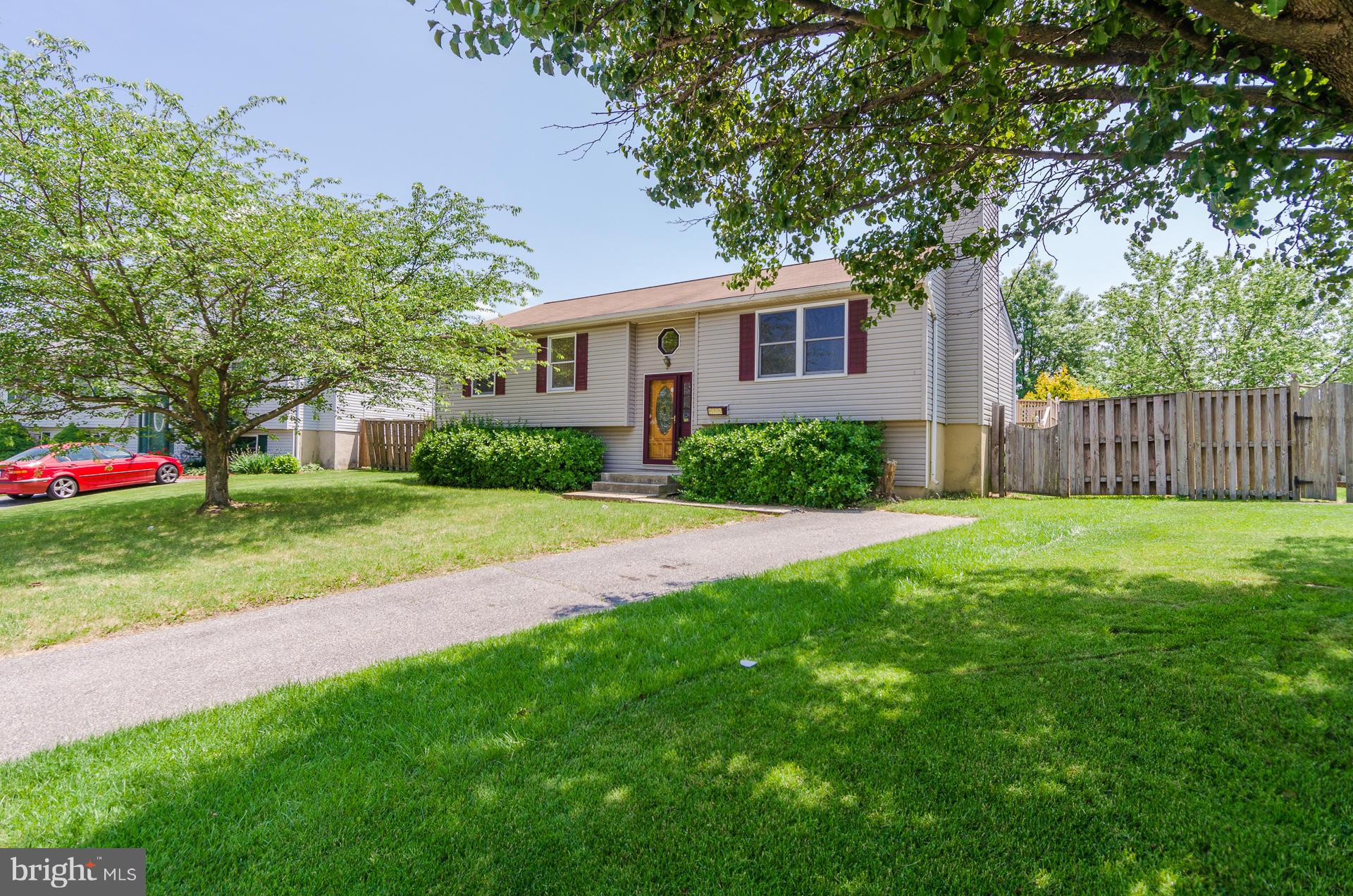 3123 Ripple Road Baltimore, MD 21244 - Photo 28 of 29 a view of a house with a yard