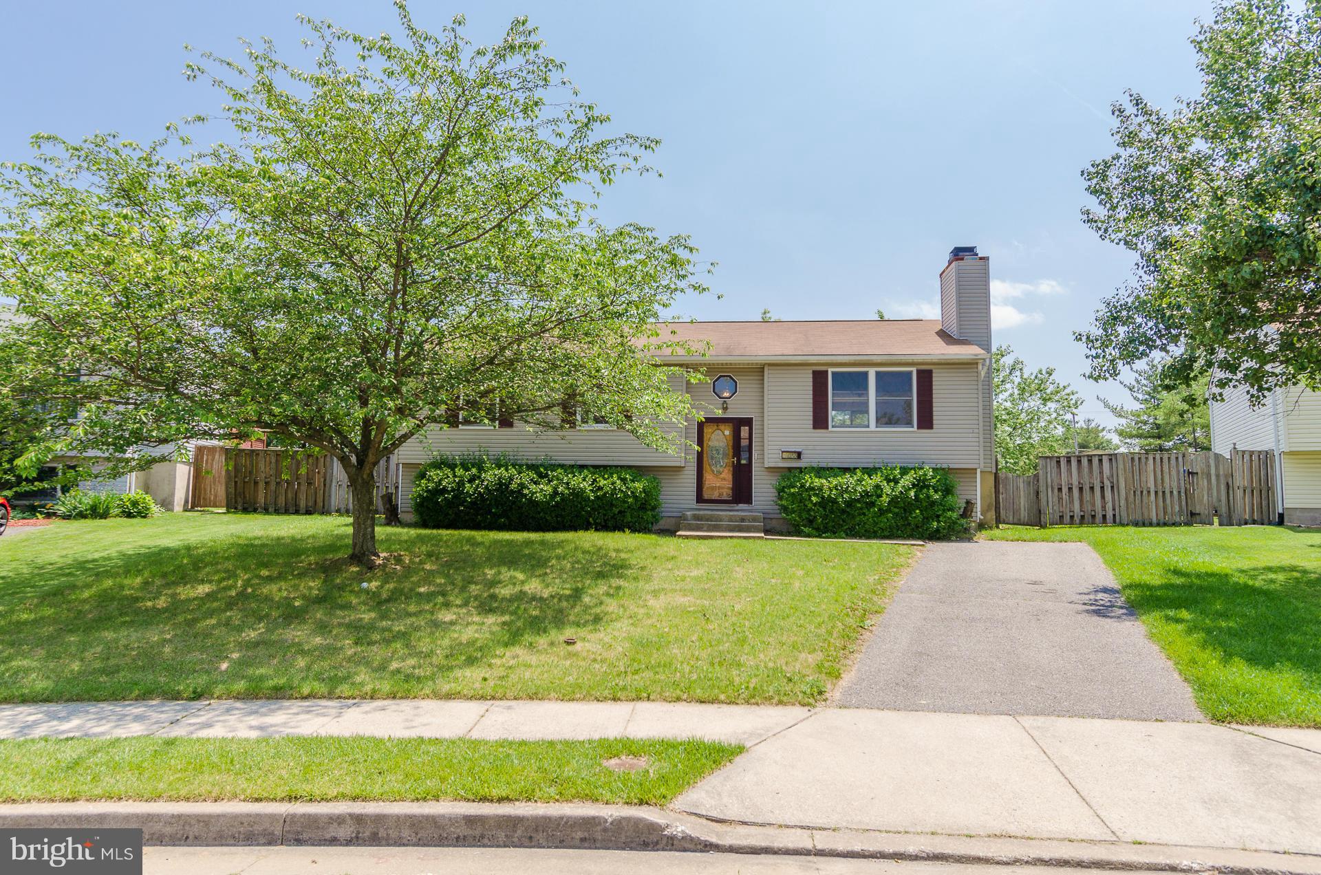 3123 Ripple Road Baltimore, MD 21244 - Photo 29 of 29 a front view of a house with a yard