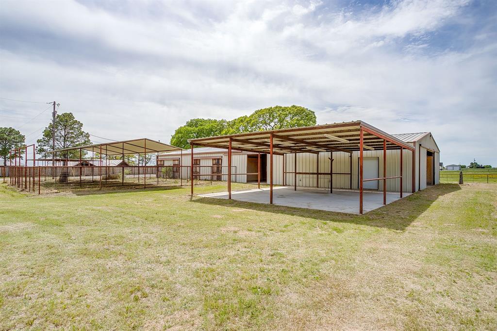 990 Doss Road Millsap, TX 76066 - Photo 11 of 39 a view of a large pool with lawn chairs
