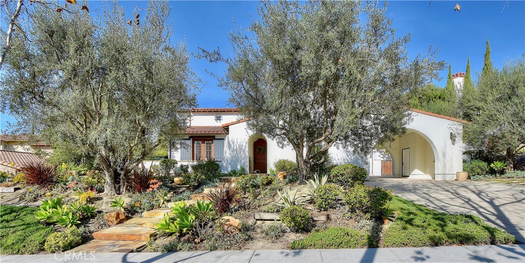 5 Anapamu Street Ladera Ranch, CA 92694 - Photo 1 of 1 a front view of a house with garden
