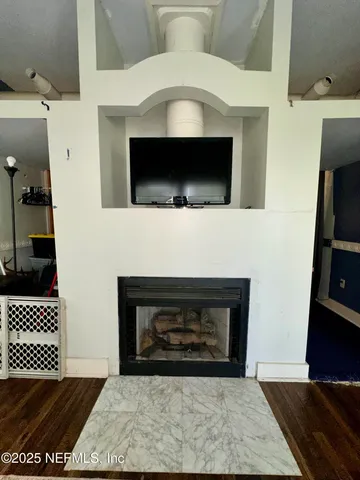 a living room with a fireplace