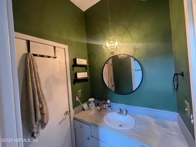 a view of a balcony with wooden floor