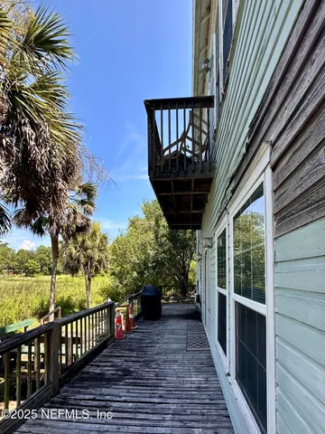 a view of a street with wooden floor